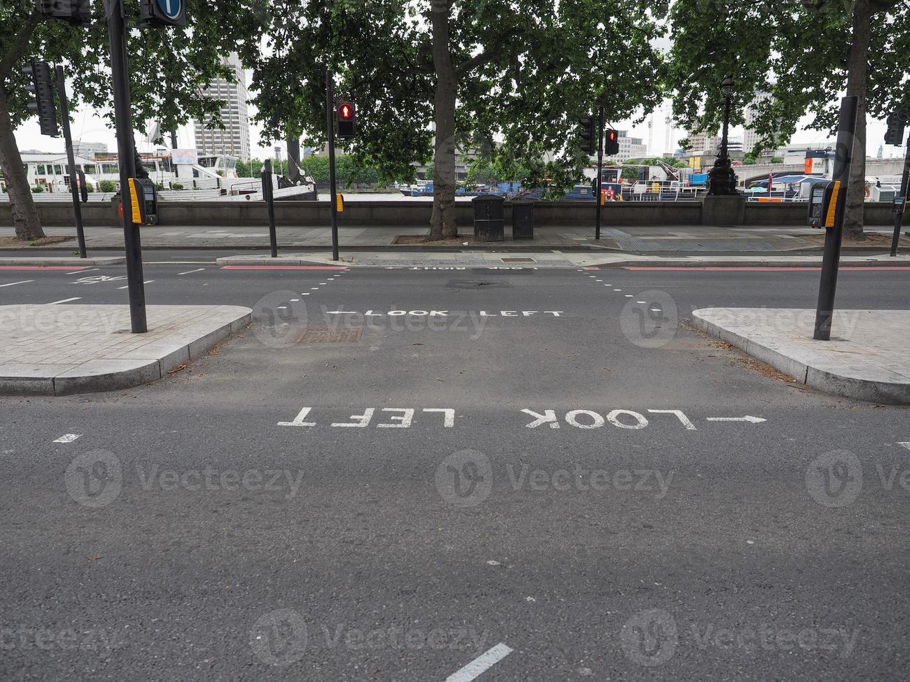 Look left sign on a street in London, UK photo