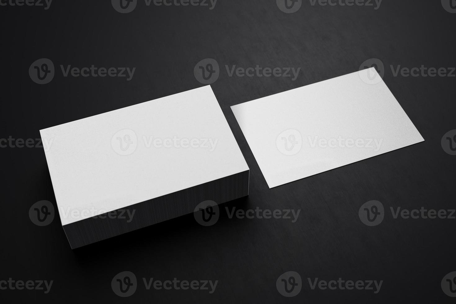 White horizontal business card paper mockup template with blank space cover for insert company logo or personal identity on black cardboard floor background. Modern concept. 3D illustration render photo