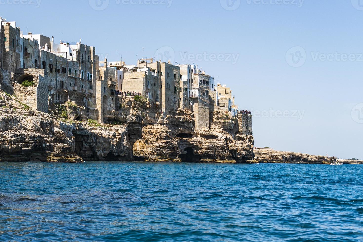 Polignano a Mare seen from the sea photo