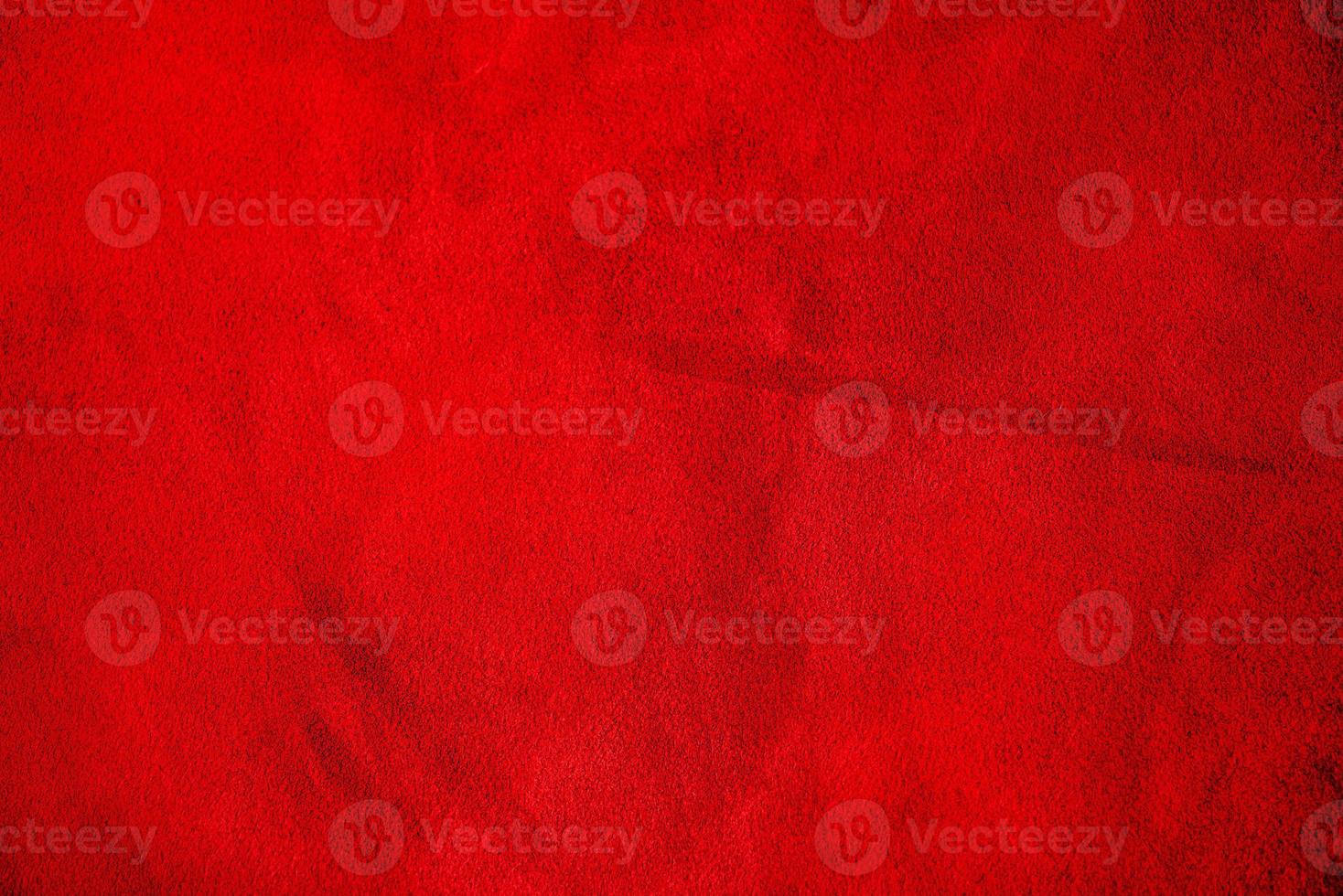 Red suede leather as background, velvet red texture photo