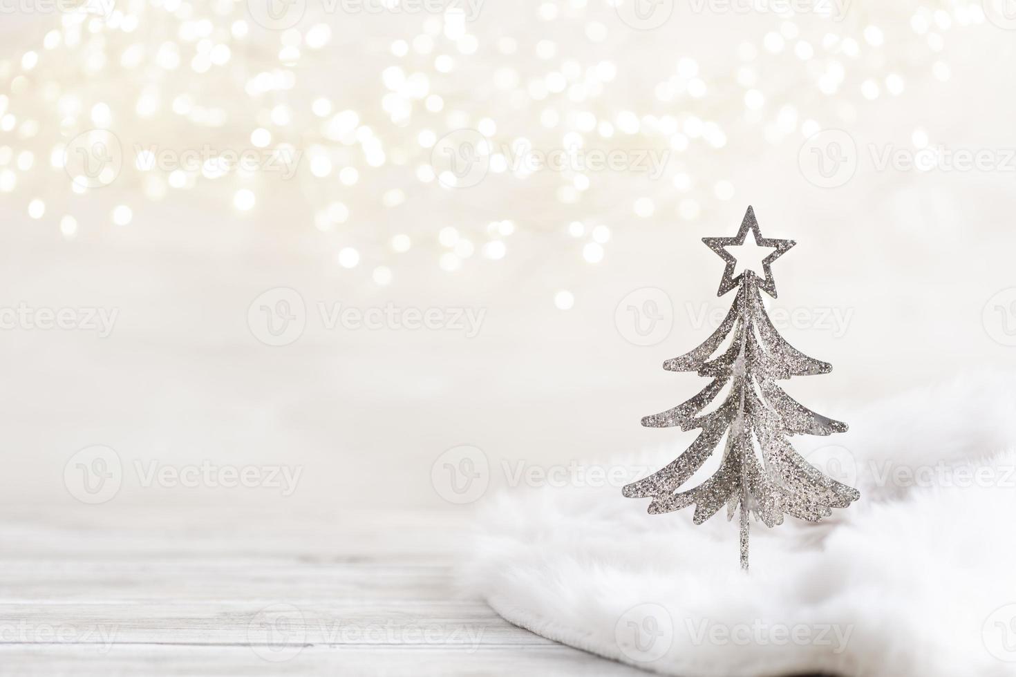 Christmas little trees and golden lights bokeh photo