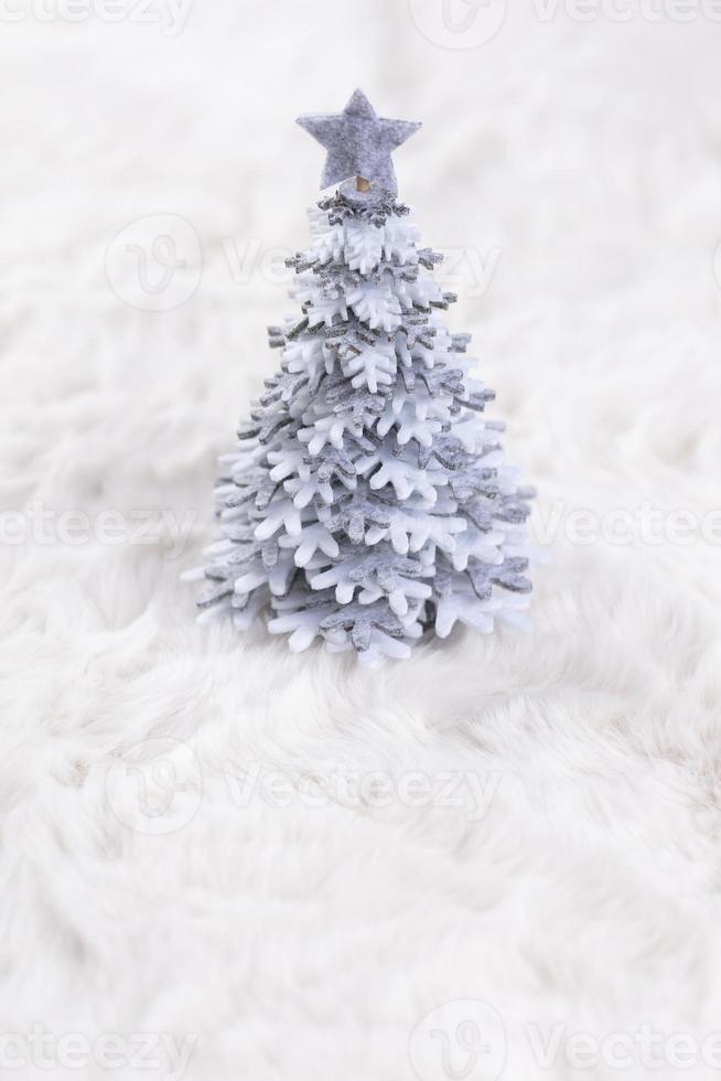 Christmas little trees and wool background photo