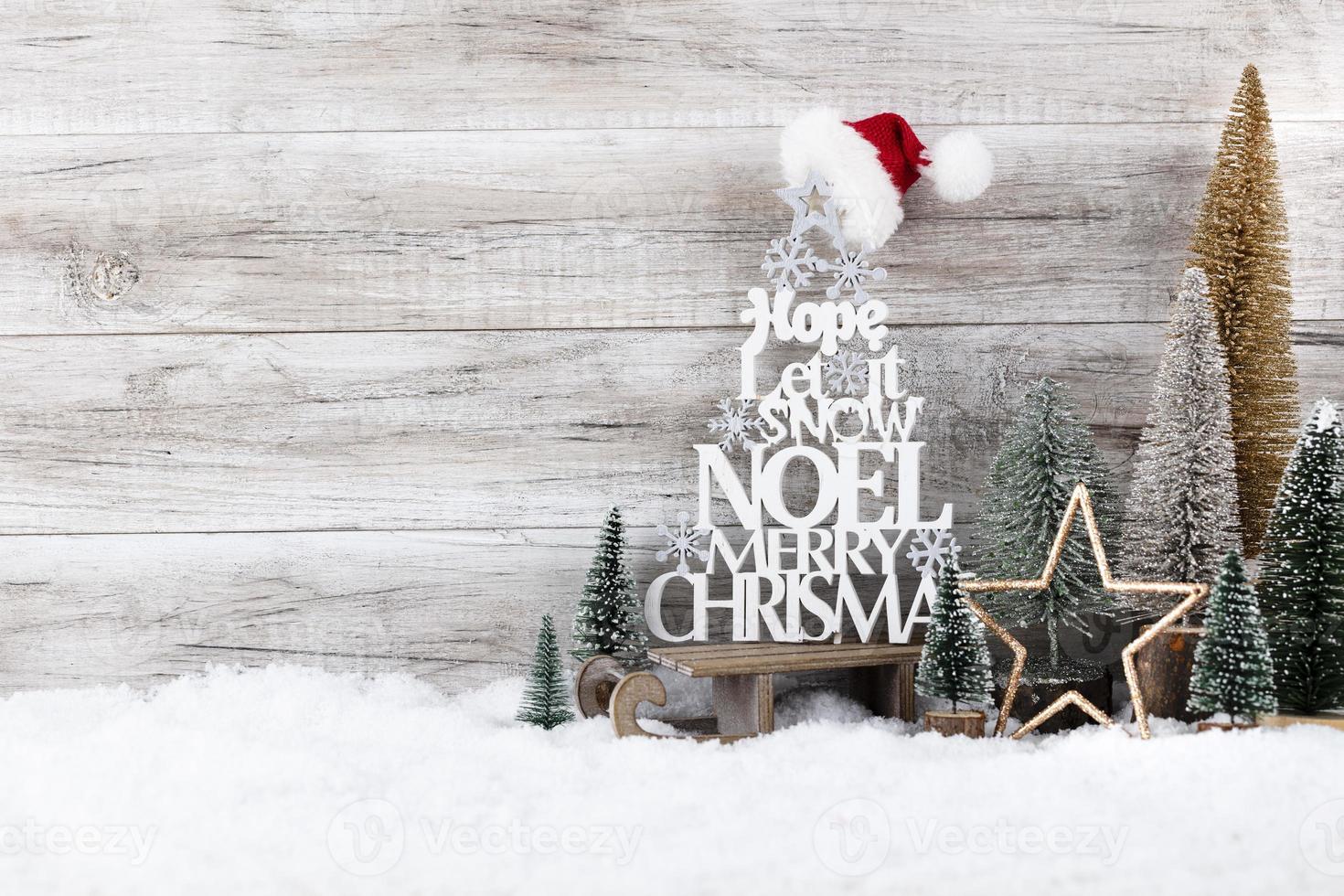 Christmas tree on wooden background photo