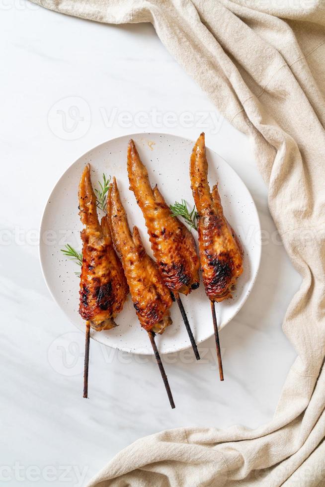 grilled chicken wings skewer photo