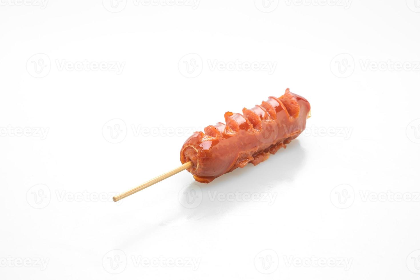 fried sausage skewer on white background photo