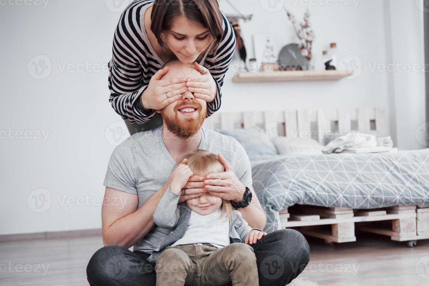 happy family mother, father, child daughter at home photo