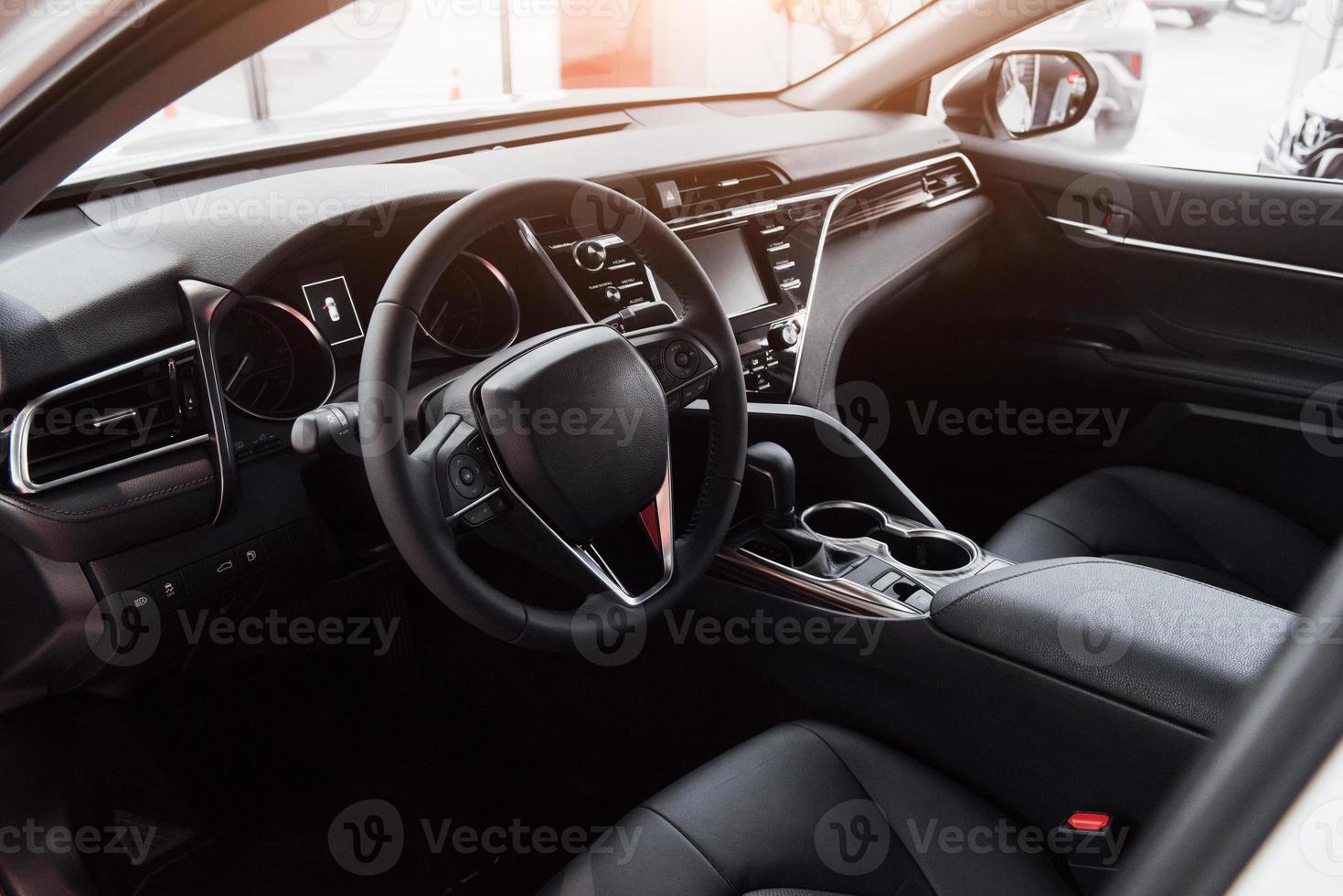 View of the interior of a modern automobile showing the dashboard photo