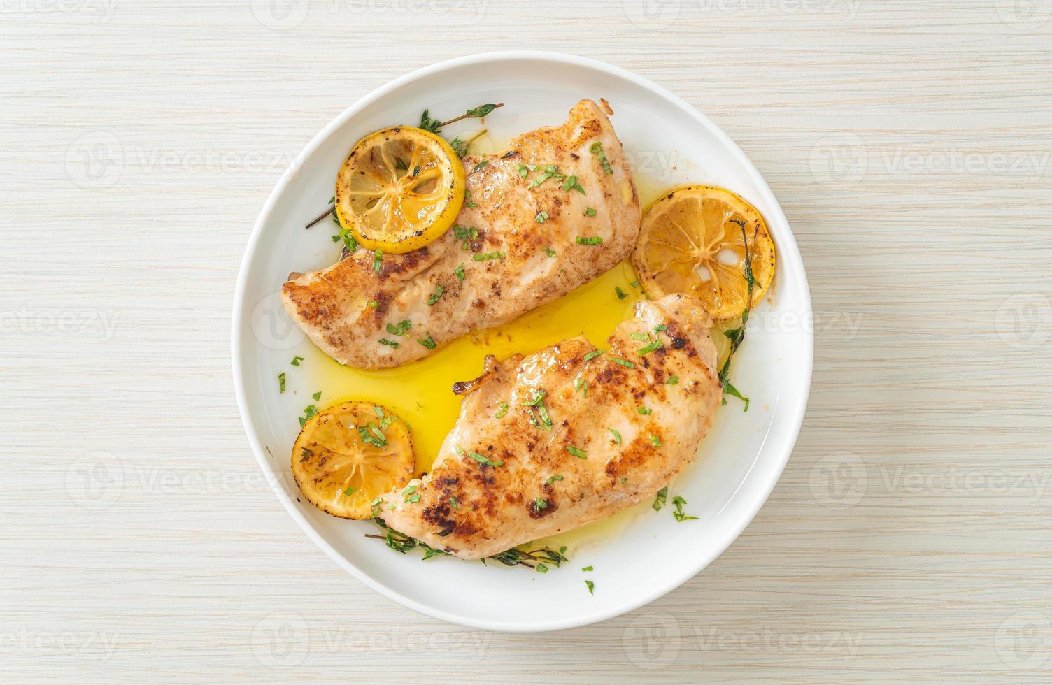 grilled chicken with butter, lemon and garlic photo