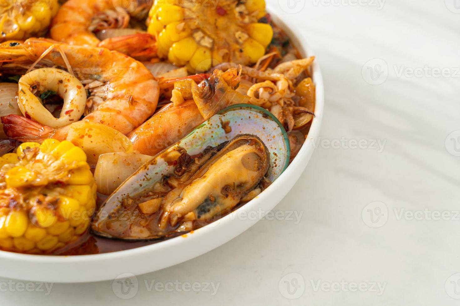 spicy barbecue seafood - shrimps, sqiud, mussel photo