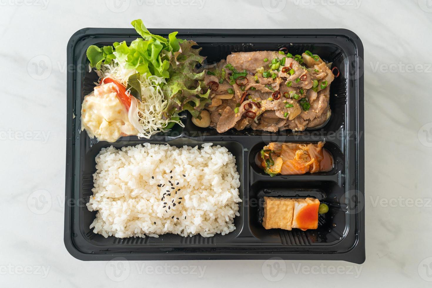 Japanese rice with pork yaki bento set photo