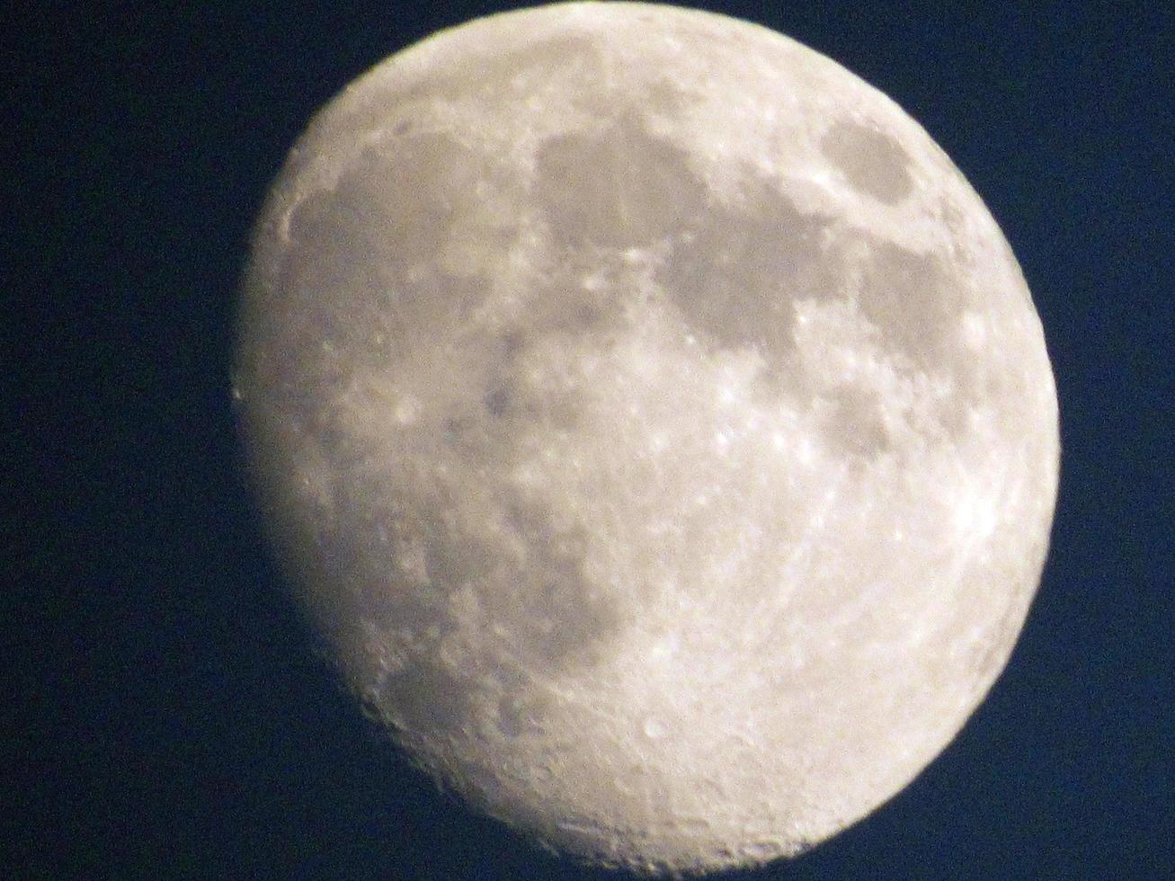 Full moon in the night sky. Moon on the black background photo