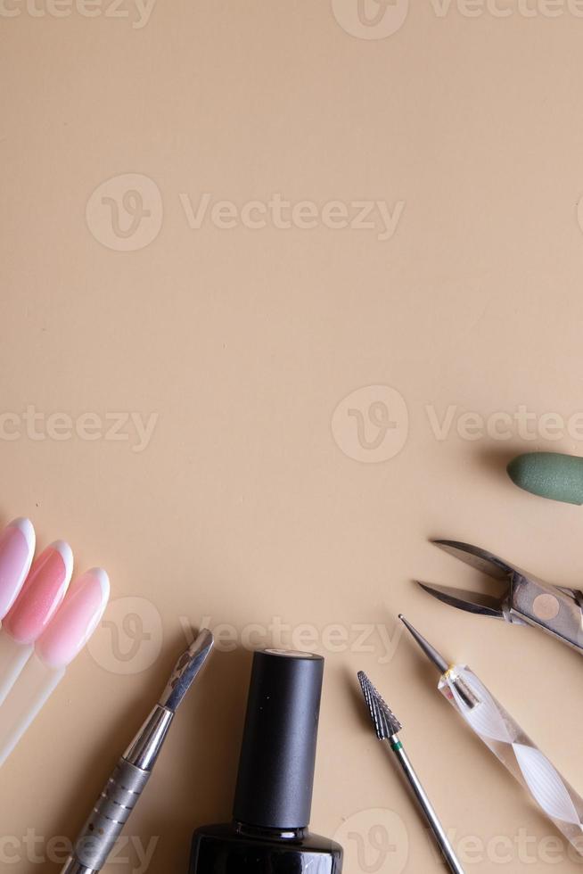 Manicure tools and tips with copy space drawings photo