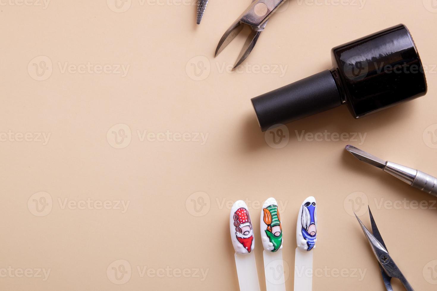 Manicure tools and tips with copy space drawings photo