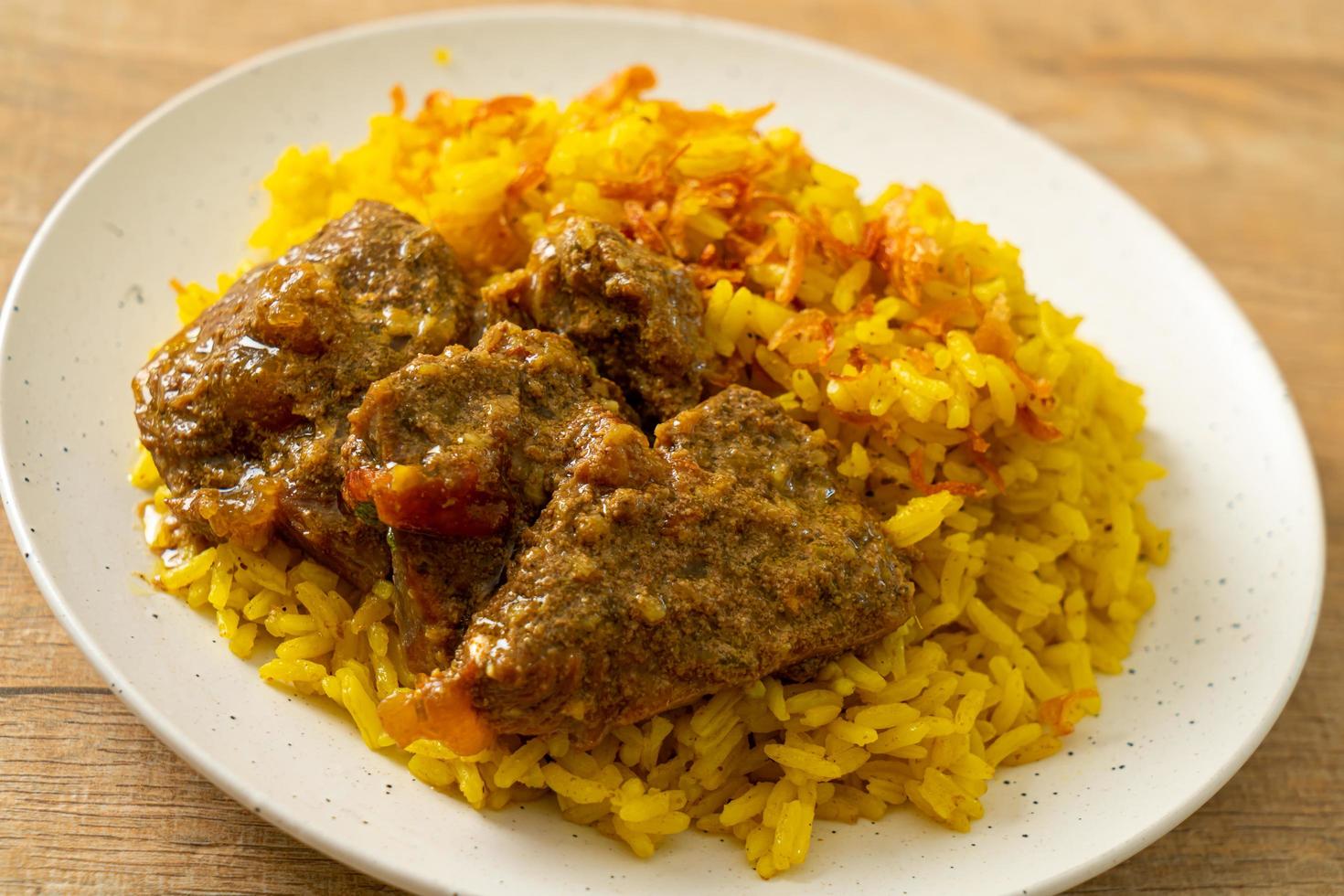 Beef Biryani or Curried rice and beef - Thai-Muslim version of Indian biryani, with fragrant yellow rice and beef photo