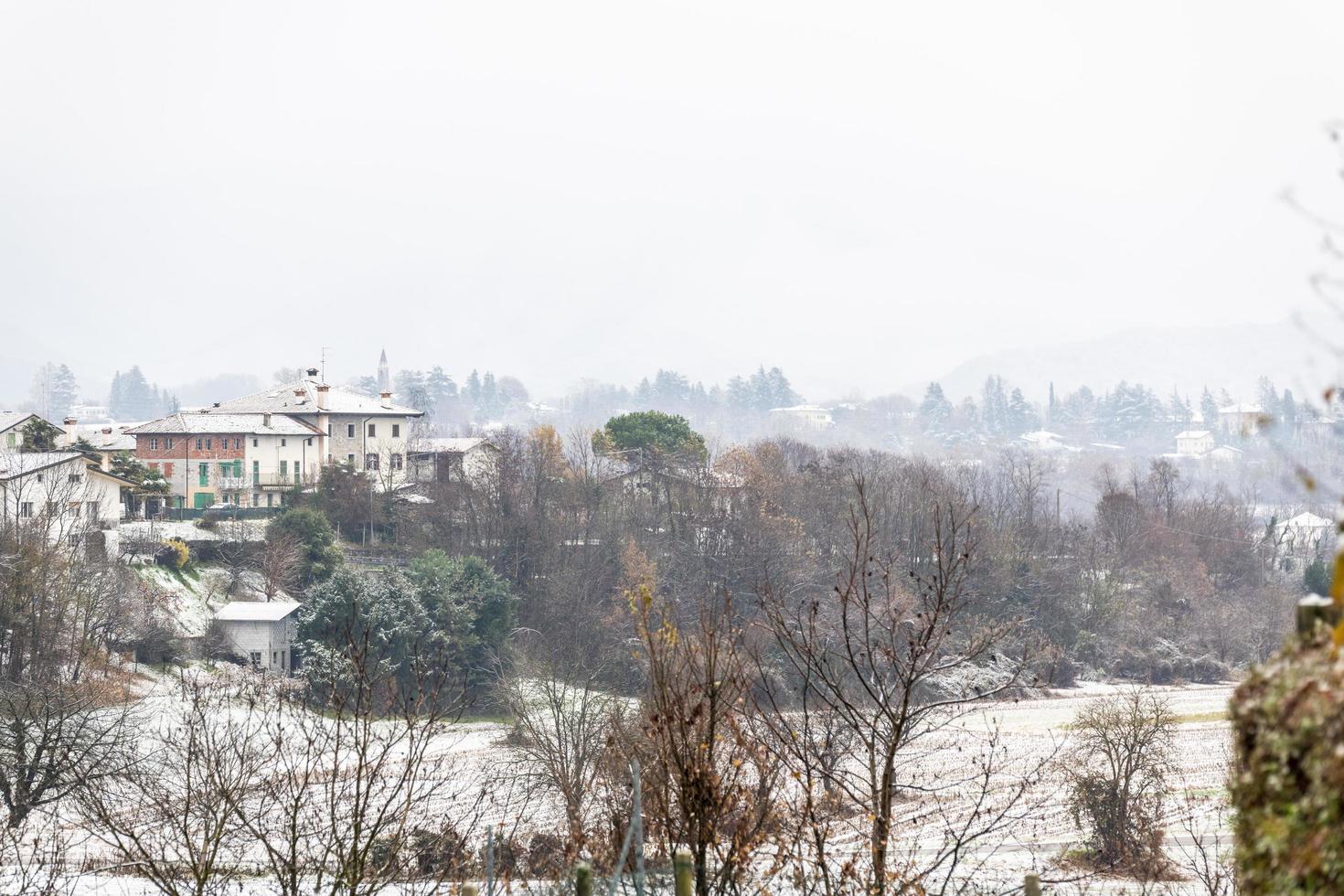 First snow on the hill towns. Between autumn and winter photo