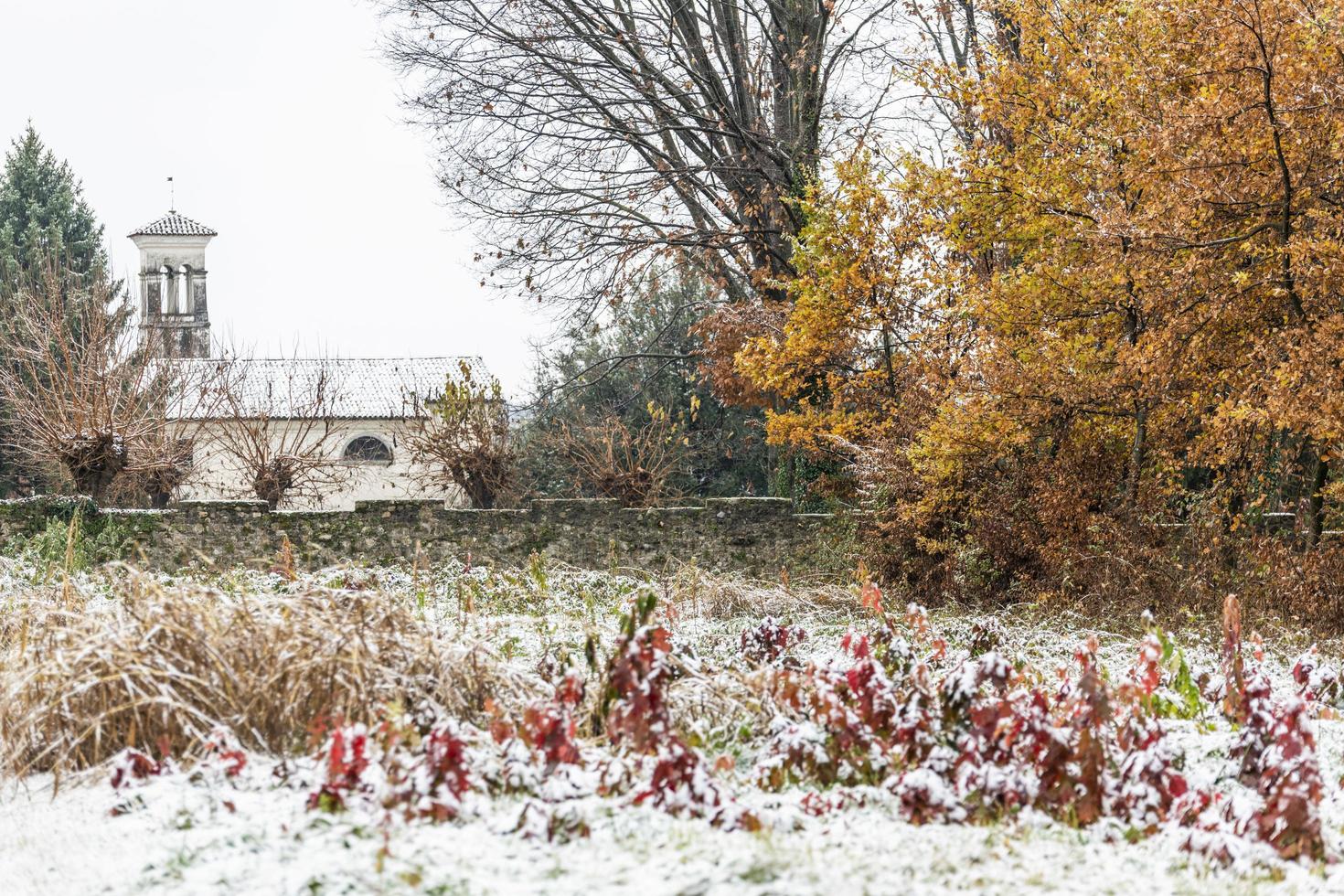 First snow on the hill towns. Between autumn and winter photo