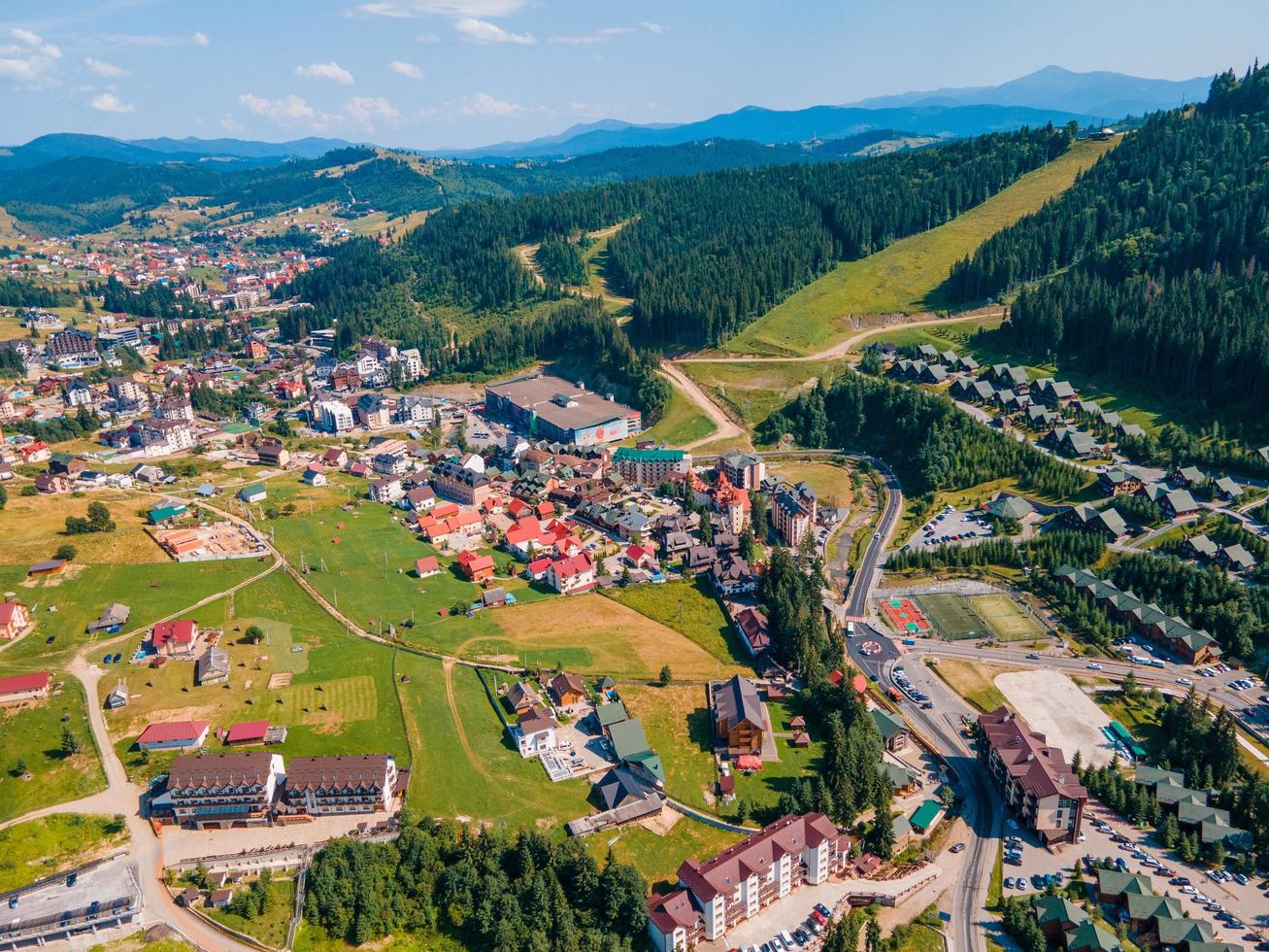 Aerial view of summer bukovel in ukrainian carpathian mountains photo