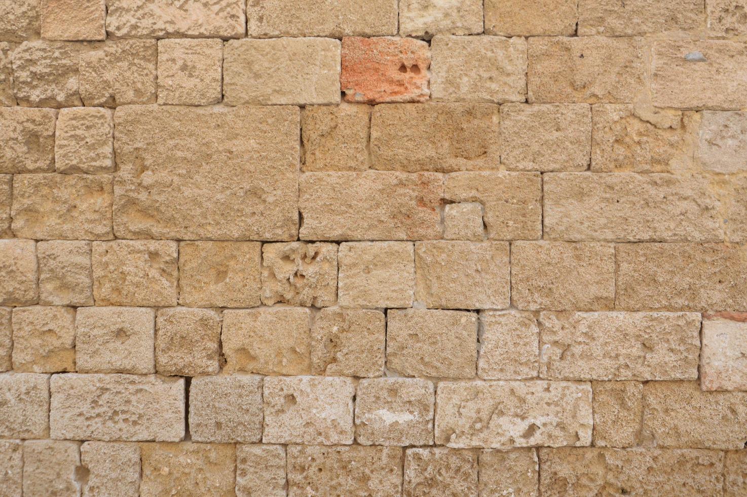 Texture of ancient masonry walls in Rhodes island in Greece photo