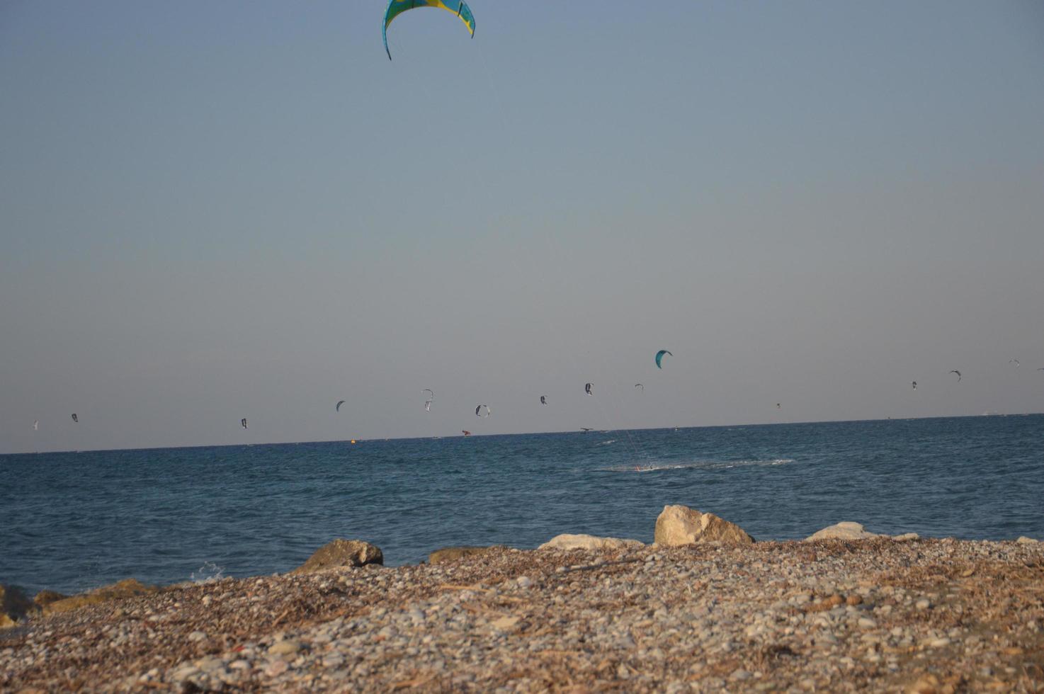 THEOLOGOS, RHODOS, GREECE - SEPTEMBER 16, 2021 Kitesurfing in the Aegean Sea photo