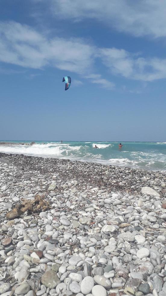 THEOLOGOS, RHODOS, GREECE - SEPTEMBER 16, 2021 Kitesurfing in the Aegean Sea photo