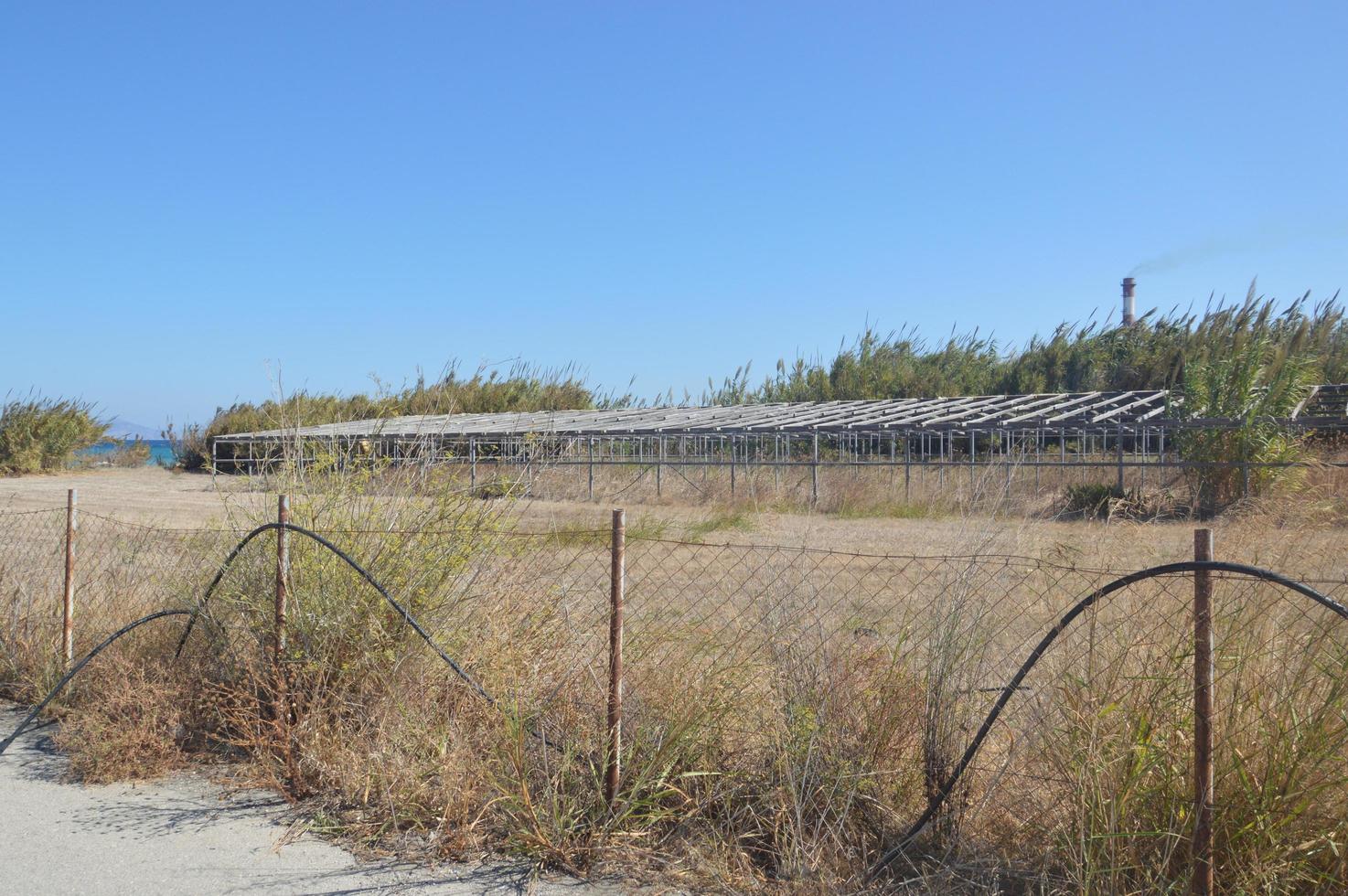 Old wooden greenhouses on the island of Rhodes in Greece photo