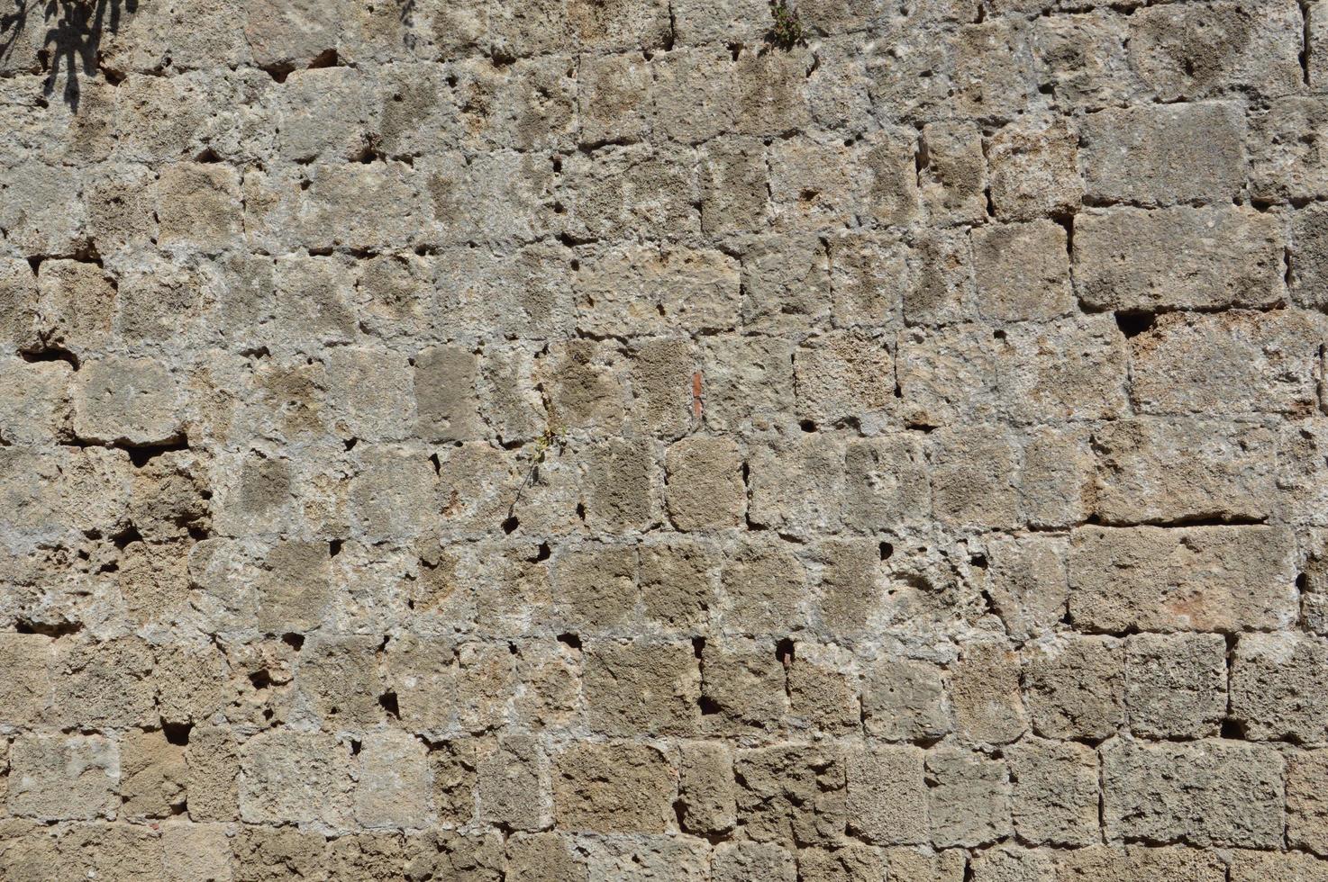 Texture of ancient masonry walls in Rhodes island in Greece photo