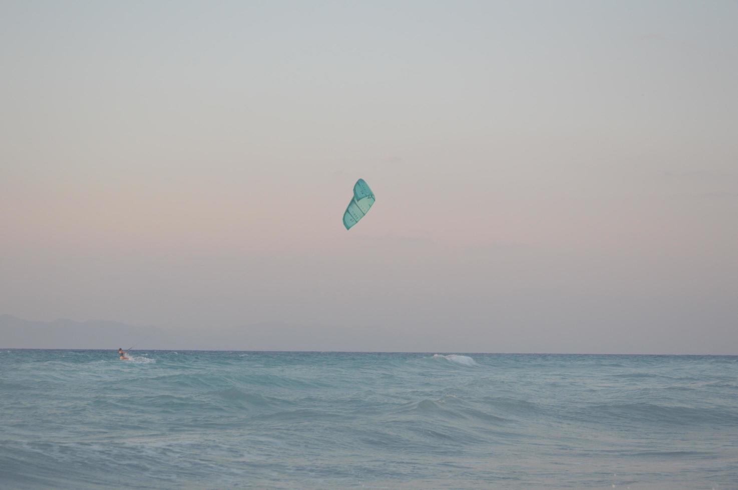 Kitesurfing in the Aegean Sea of Rhodes Island in Greece photo