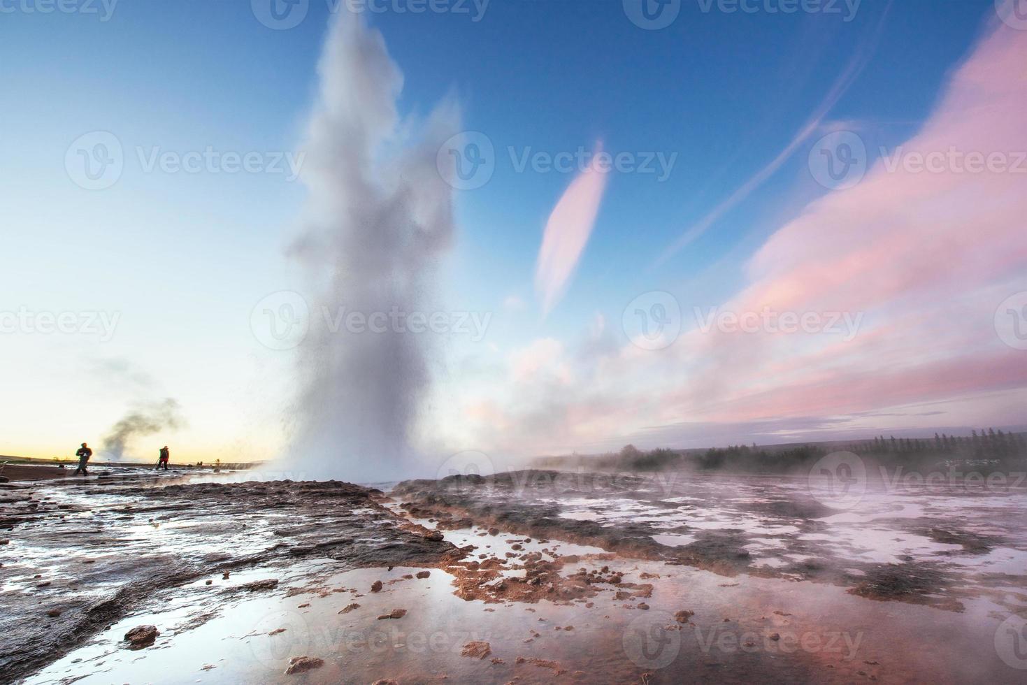 Fantastic sunset Strokkur geyser eruption in Iceland. Fantastic colors photo