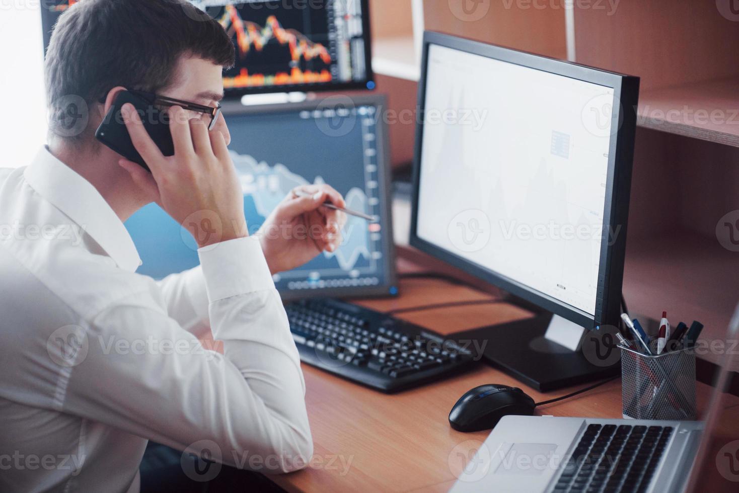 Business man investment trading do this deal on a stock exchange. People working in the office photo