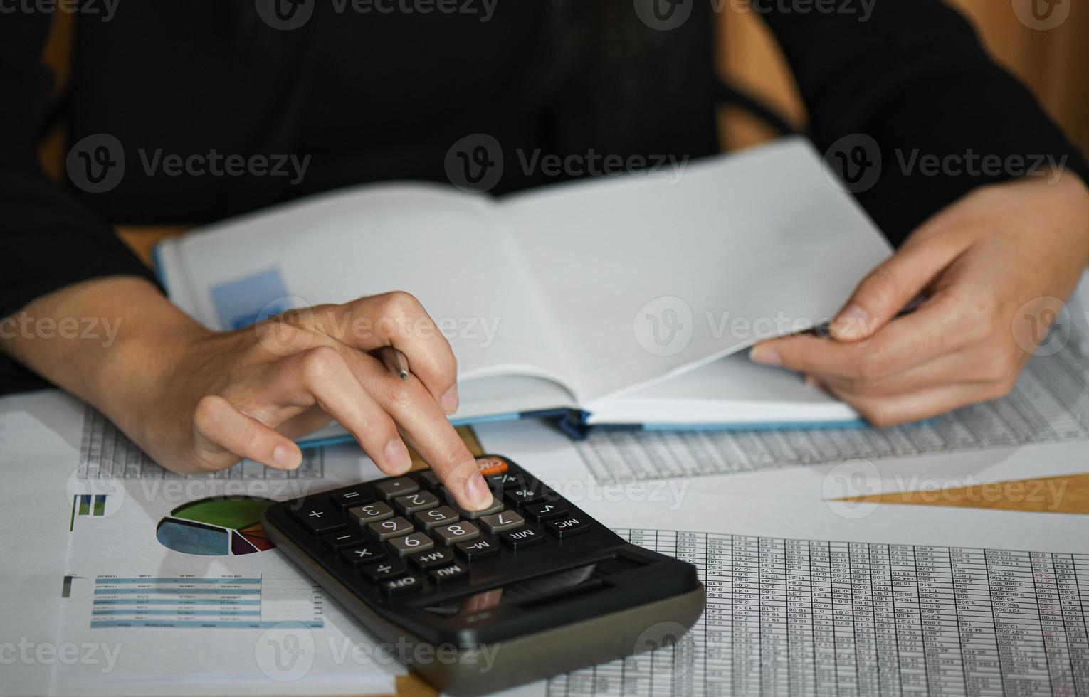 Accounting concept,Accounting staff is summarizing the company budget. photo