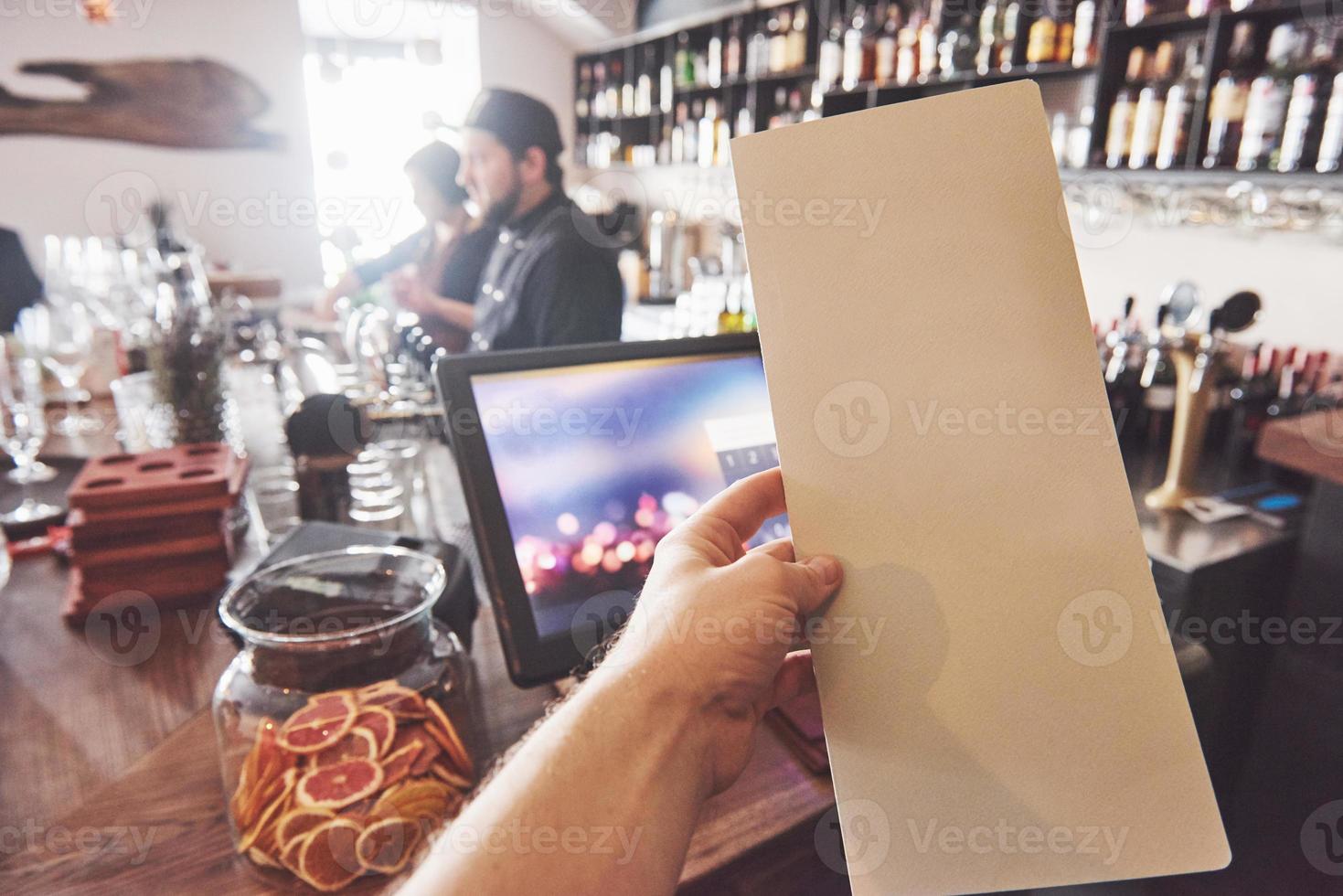 Mock up Menu frame on Table in Bar restaurant cafe Background photo