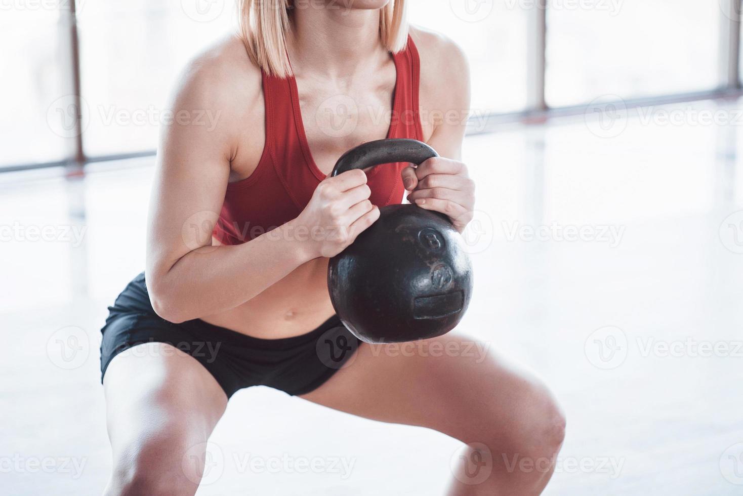 Active girl in fitness gym. Concept workout healthy lifestyle sport photo