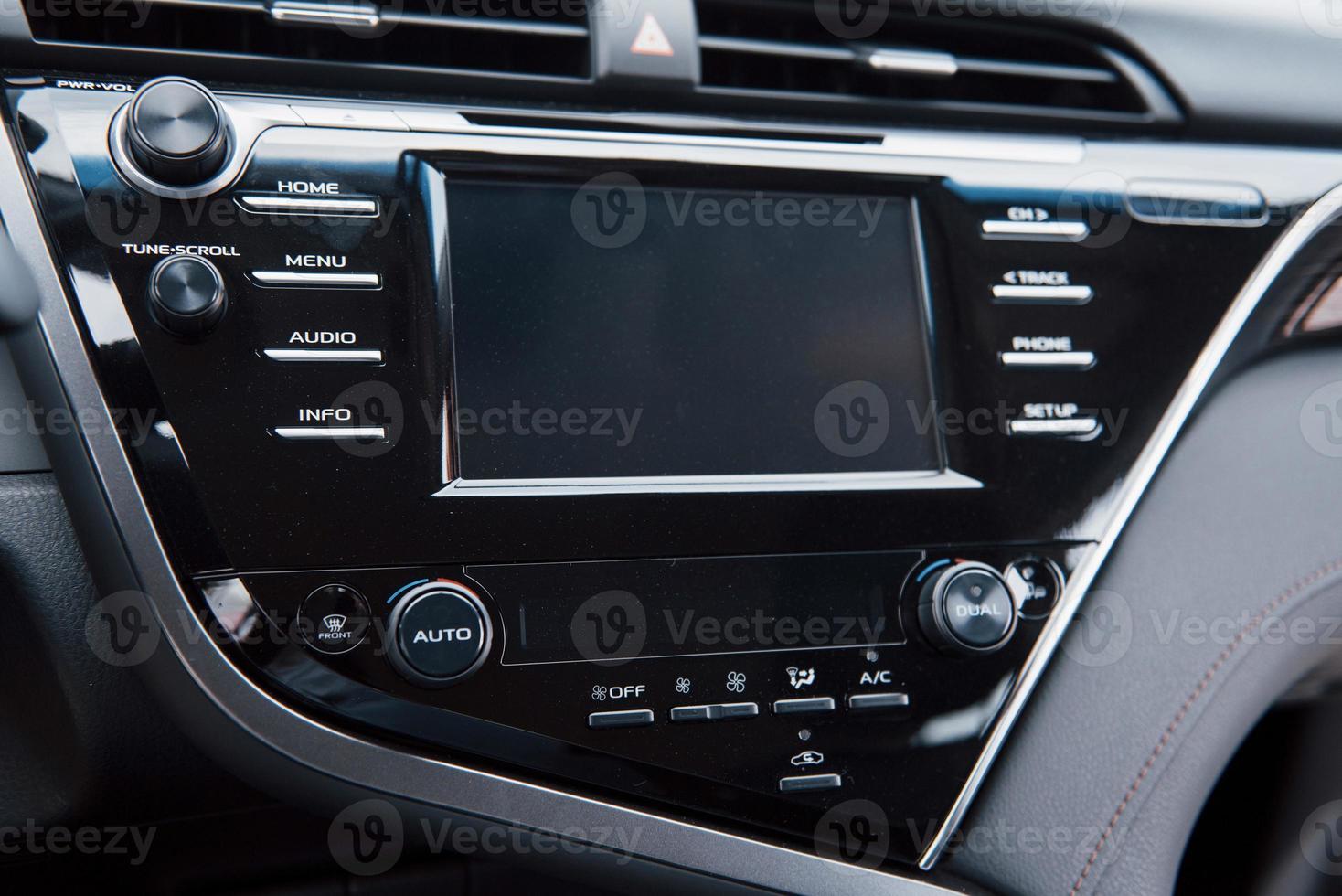 View of the interior of a modern automobile showing the dashboard photo