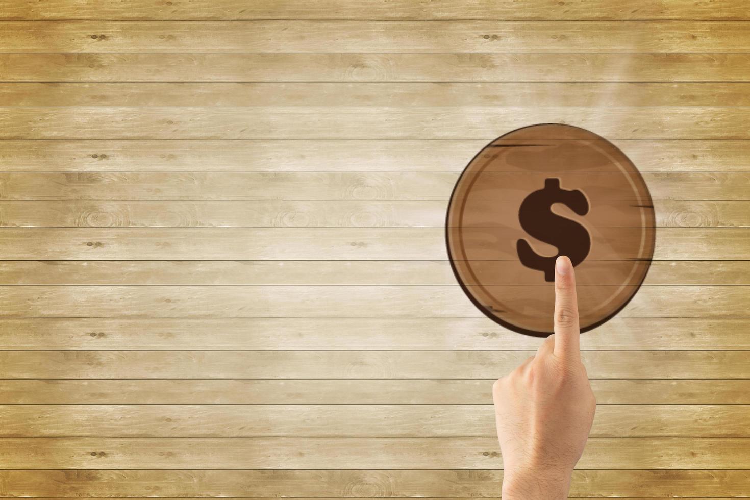 Money concept,  Hand touching with dollar sign icon, marketing concept, dollar signs on wood background and space photo