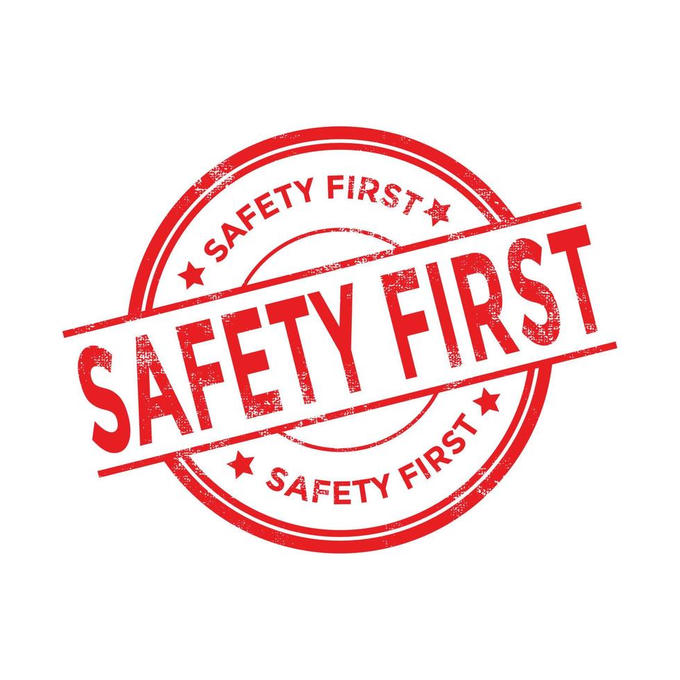 Safety first round grunge red stamp. vector