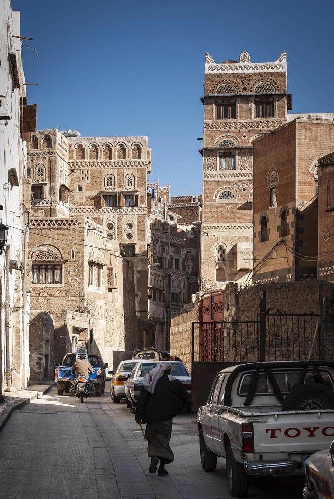 Sanaa, Yemen, 2021 - Street scene and buildings in old town photo