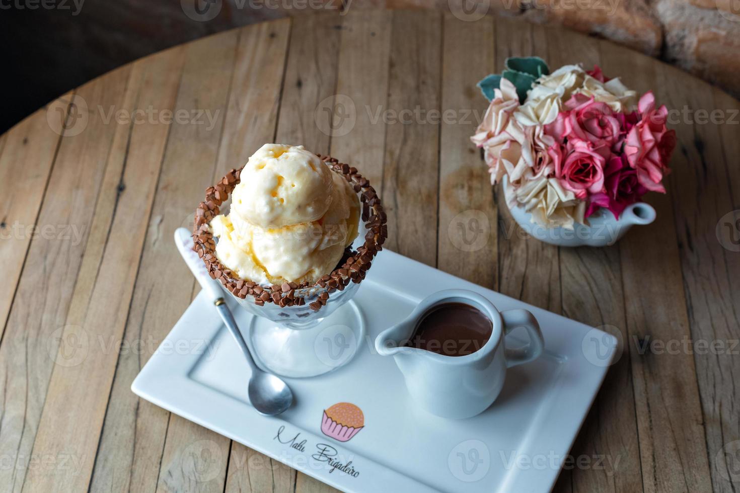 ice cream cup with chocolate sauce photo