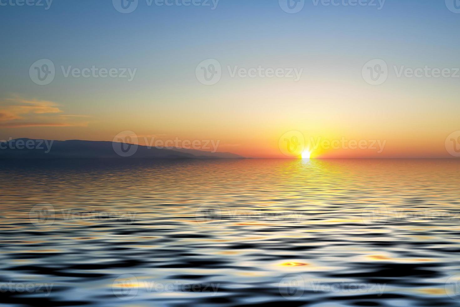 View from a height on a bright sunset over the sea. photo
