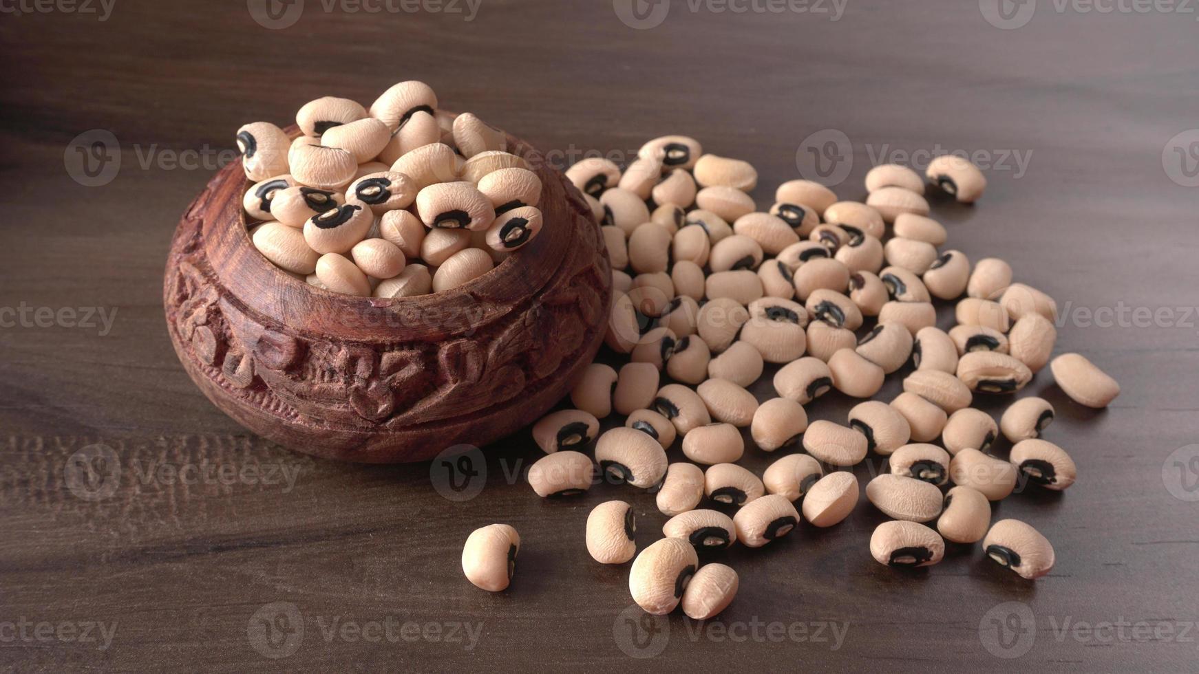 Uncooked black eyed peas. Health food concept. photo