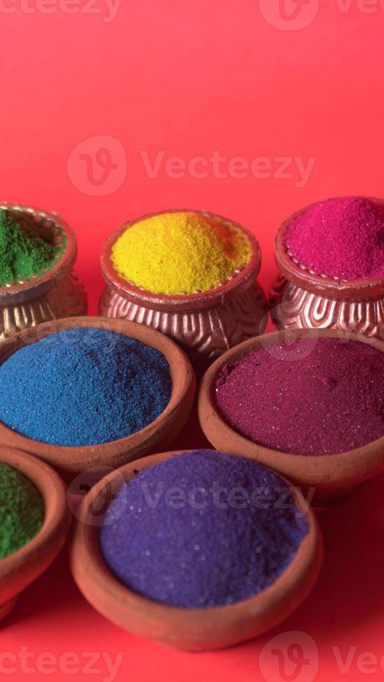 Colourful rangoli in bowls photo