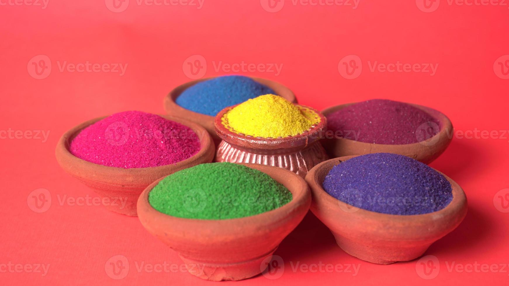 Colourful rangoli in bowls photo