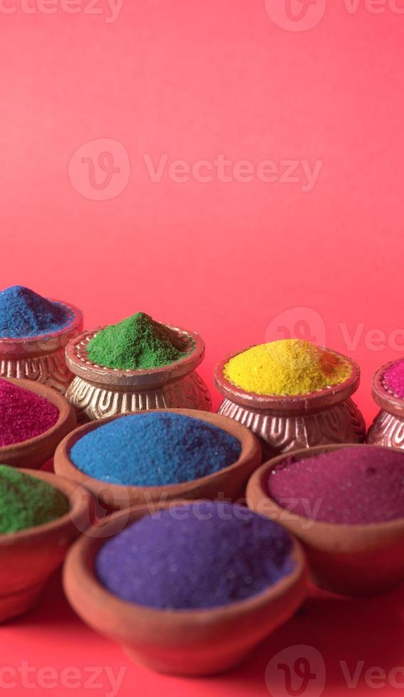 Colourful rangoli in bowls photo