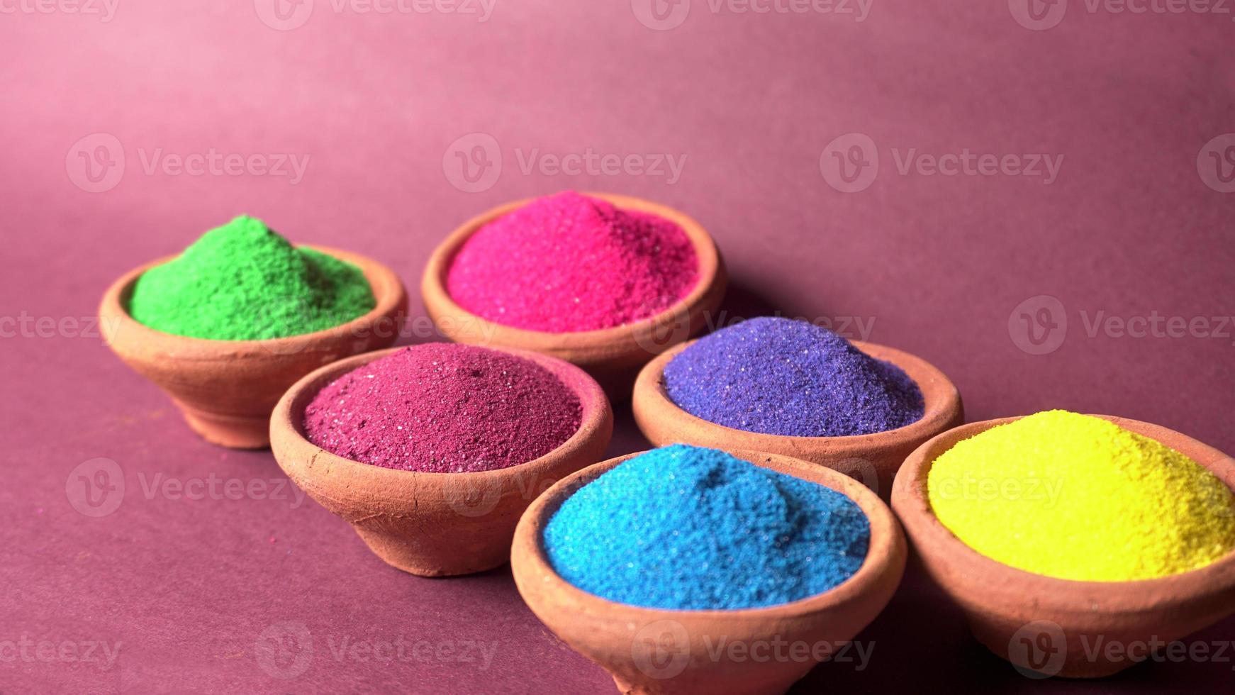 Colourful rangoli for Diwali festival in bowls photo