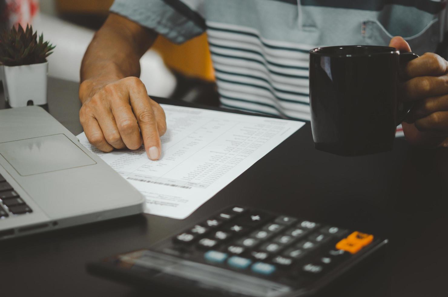 financial business documents tax marketing and computer keyboard and calculator on desk photo