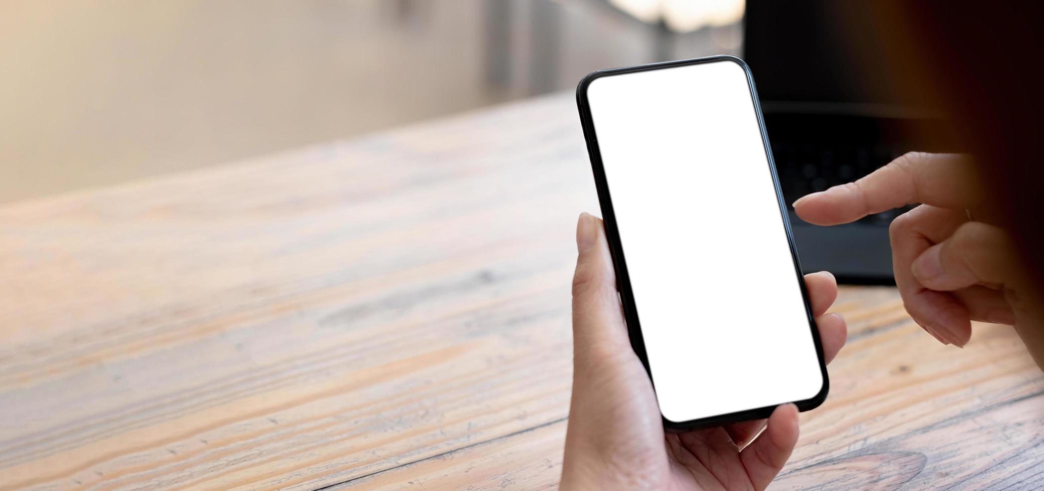 woman using Smartphone. Blank screen mobile phone for graphic display montage.networking service. photo