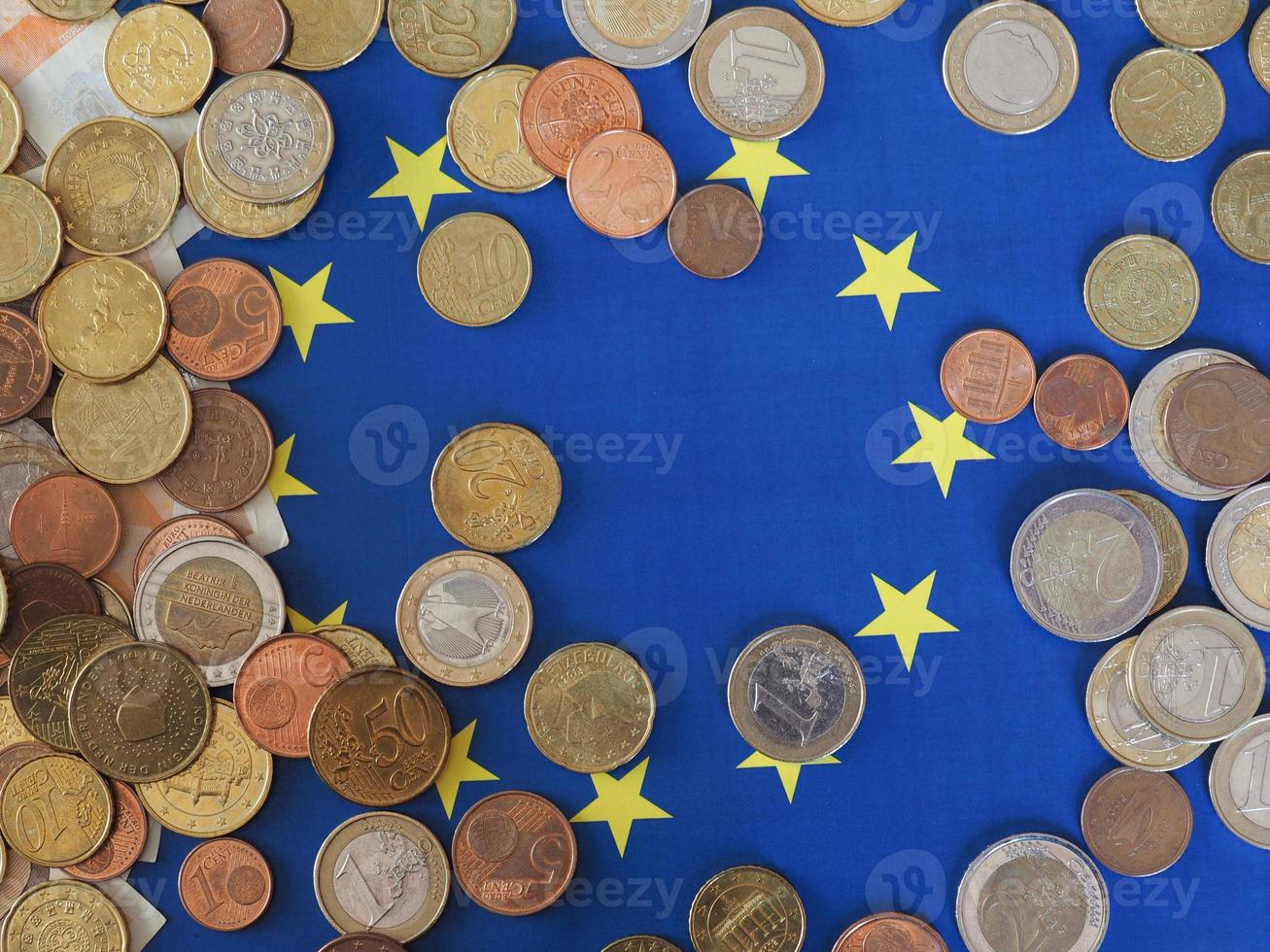 Euro coins, European Union, over flag photo
