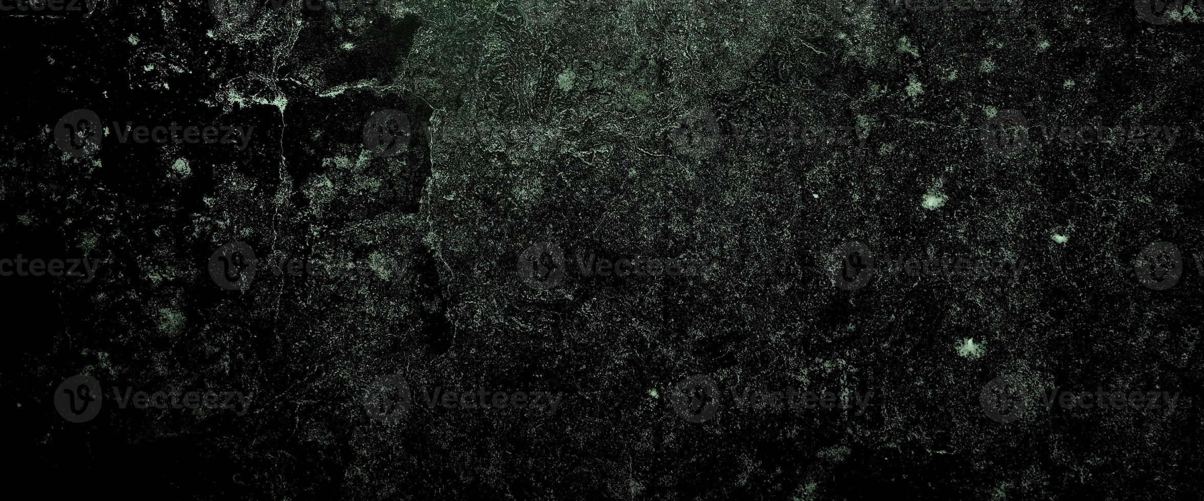 Muros oscuros de miedo, textura de cemento de hormigón negro ligeramente claro para el fondo foto
