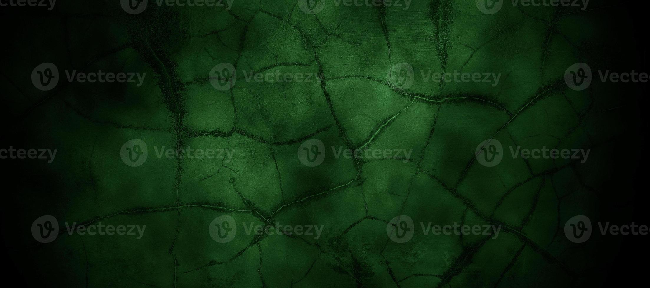 Scary dark green misty cracked wall for background photo