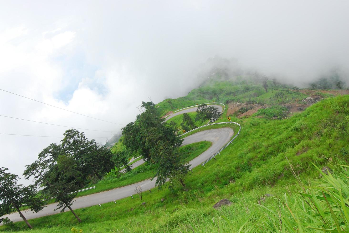 mountain road in a morning mist, thailand photo