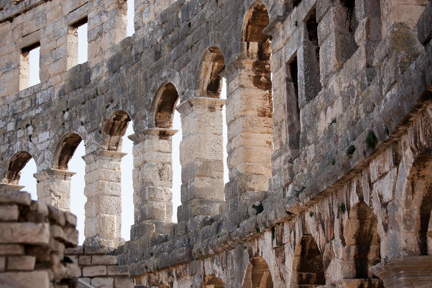 Fragment of ancient Roman amphitheater photo